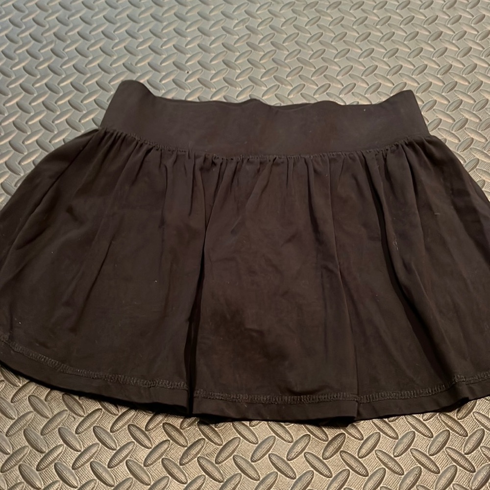 Girl super cute mini skirt with liner shorts under skirt